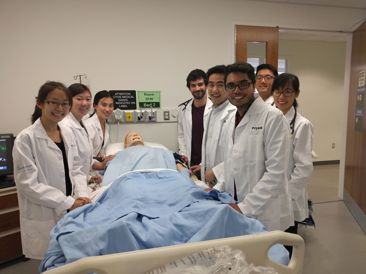 2017 ROMP students working on 'patient' at Conestoga College simulation lab 
